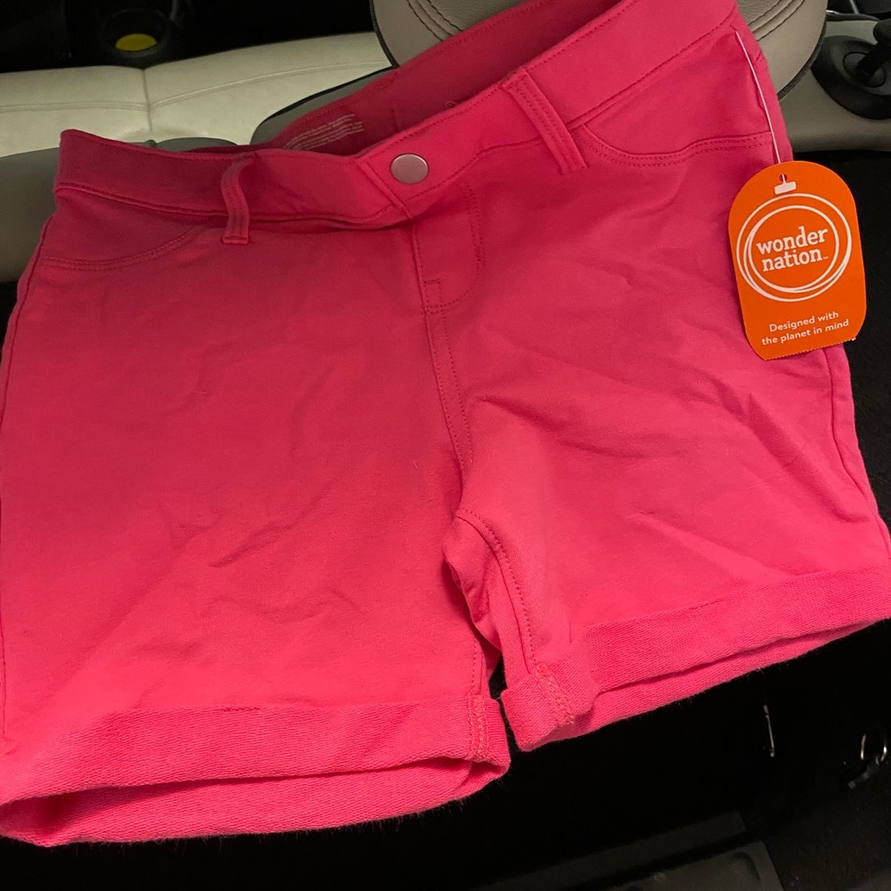 Girls pink button shorts